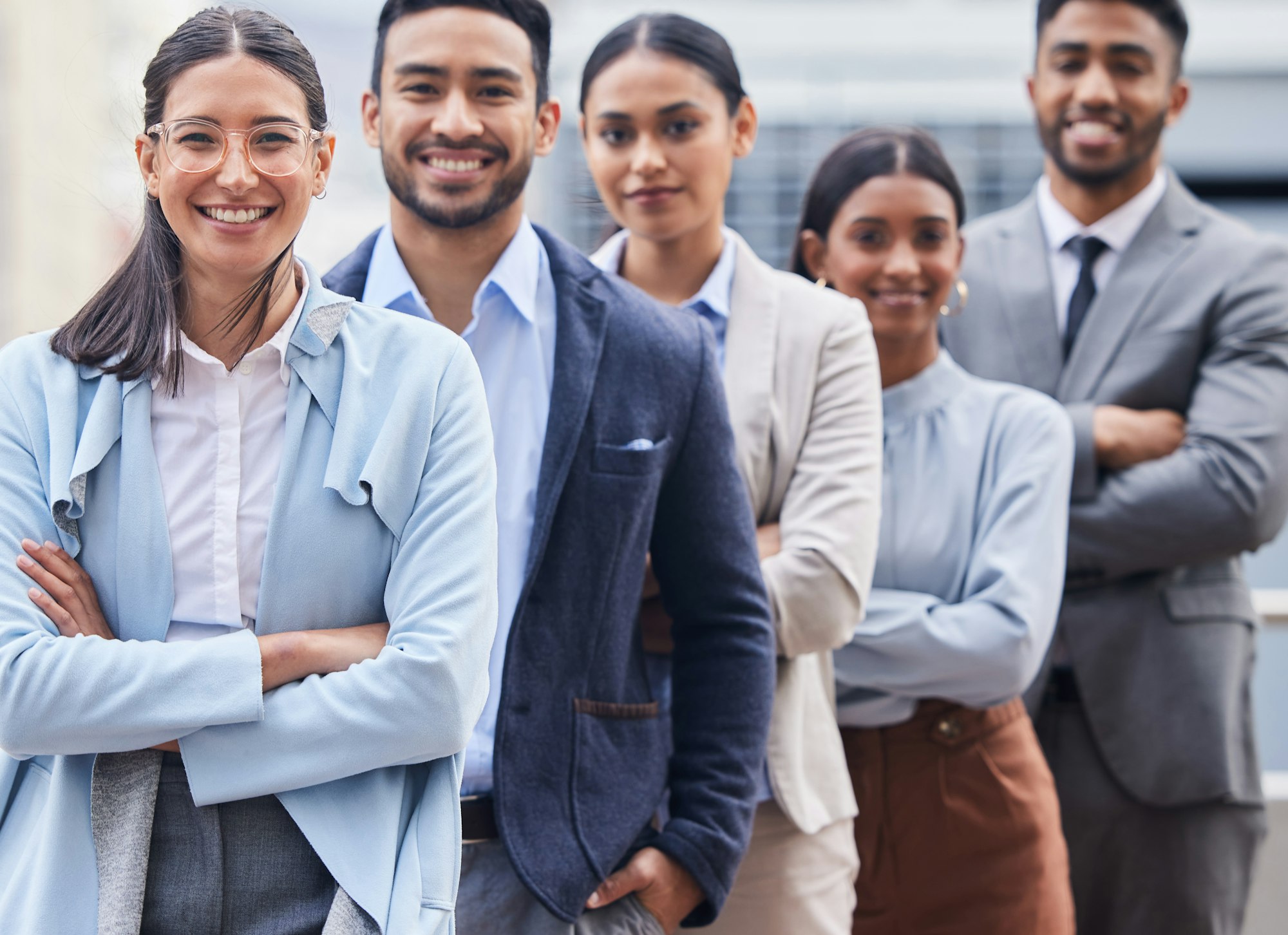 Leading this team to greatness. Shot of a diverse group of businesspeople standing in a line.